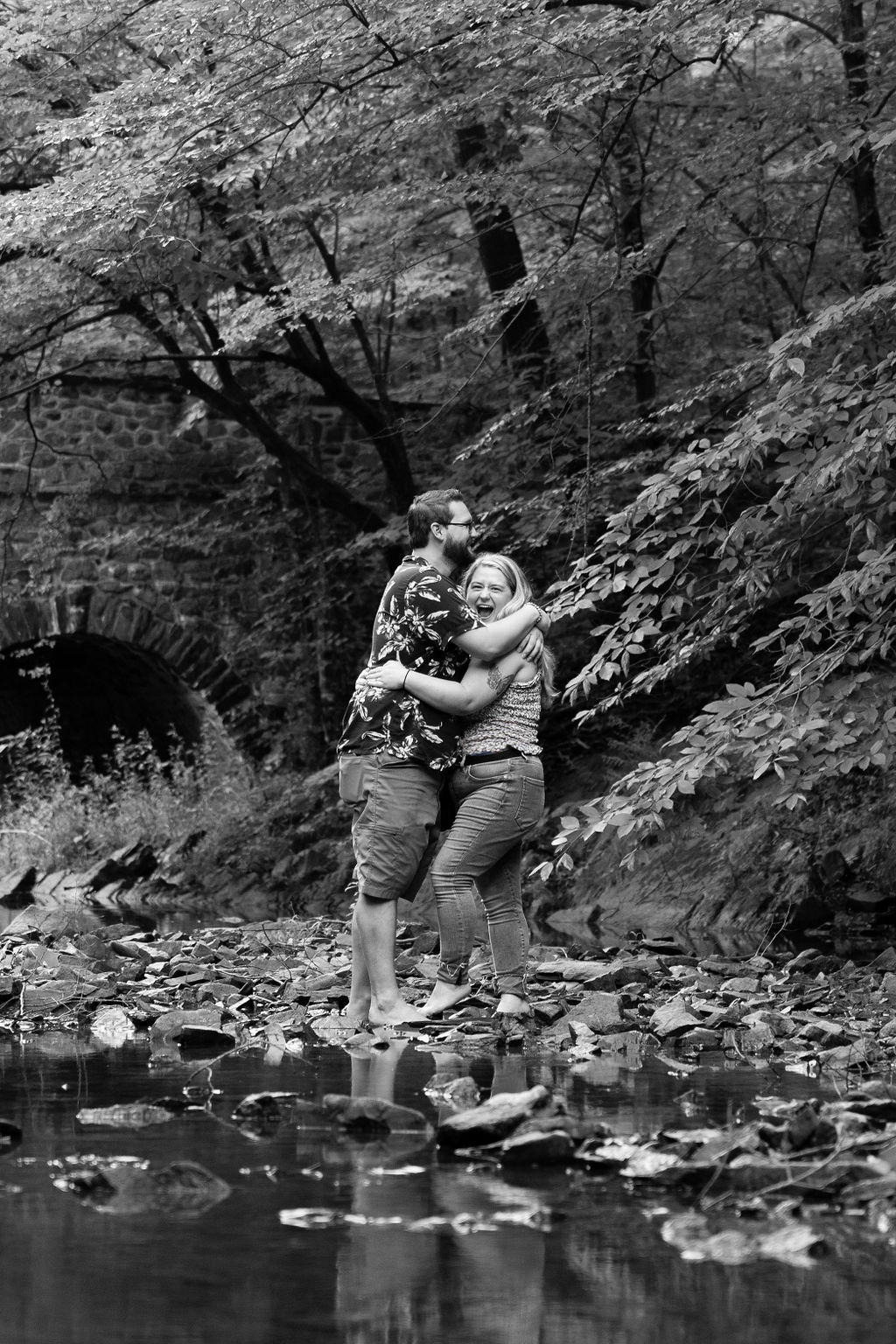 Hugging after putting the ring on her finger.